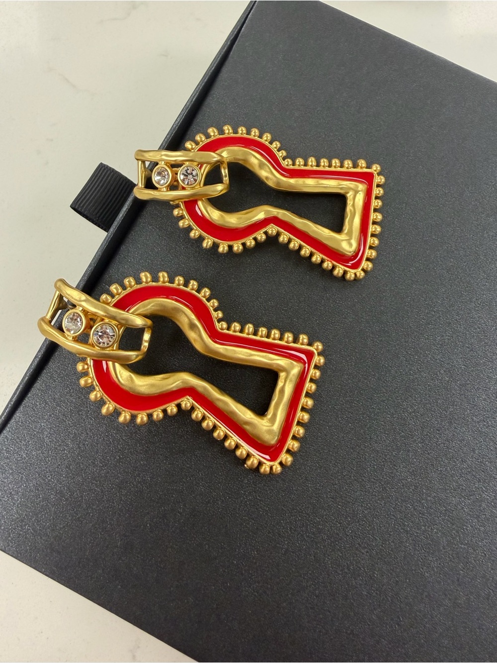 Surrealist, Schiaparelli style, keyhole stud earrings, gold with red enamel